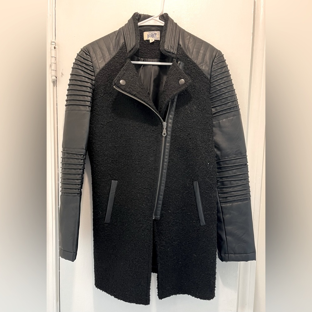 Lightly worn, faux leather coat. Perfect addition to your wardrobe!